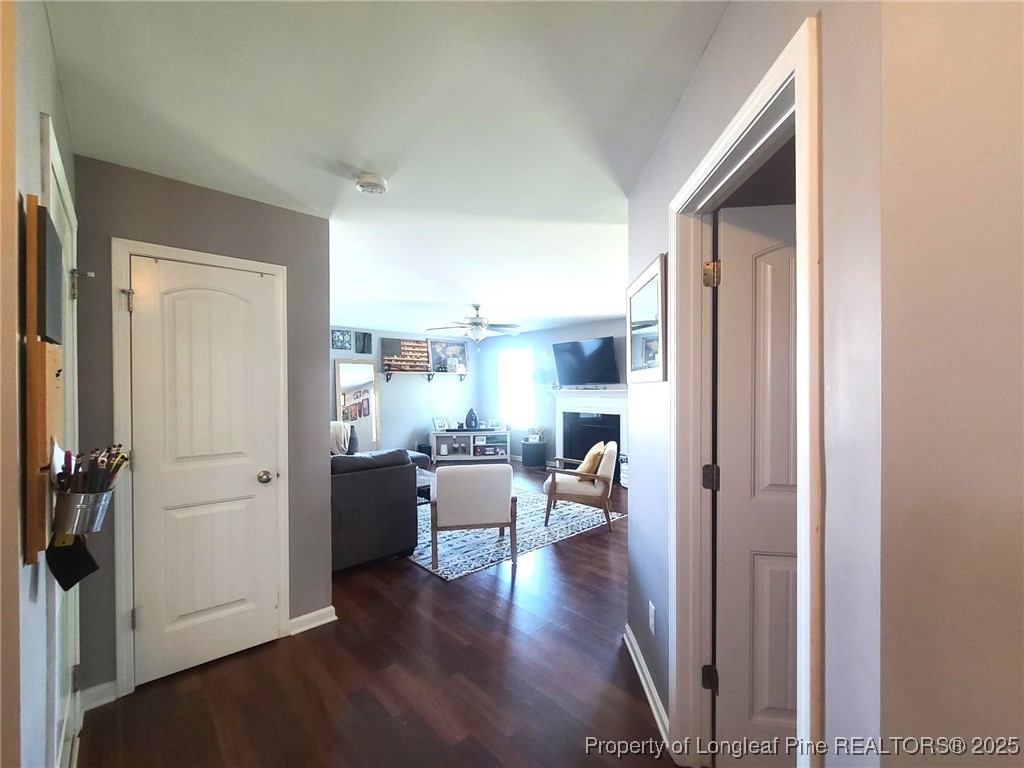 139 Spillburg Court Raeford, NC 28376 - Photo 13 of 33 a view of entryway with livingroom and wooden floor