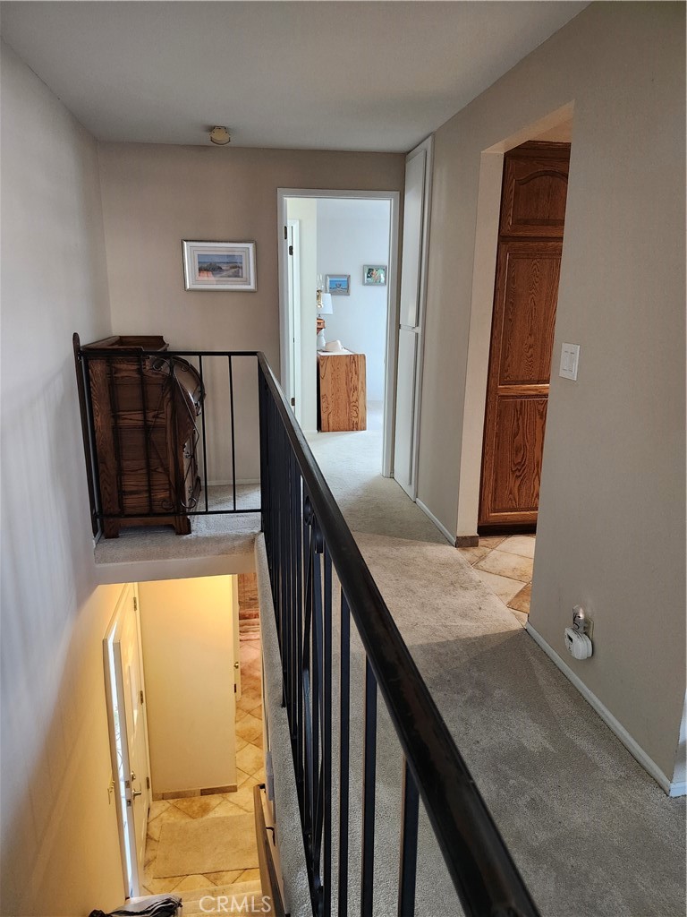 240 Melrose Drive Oxnard, CA 93035 - Photo 4 of 55 Front door Main Level Stairs. Hall to Primary En Suite & Kitchen 1st Right