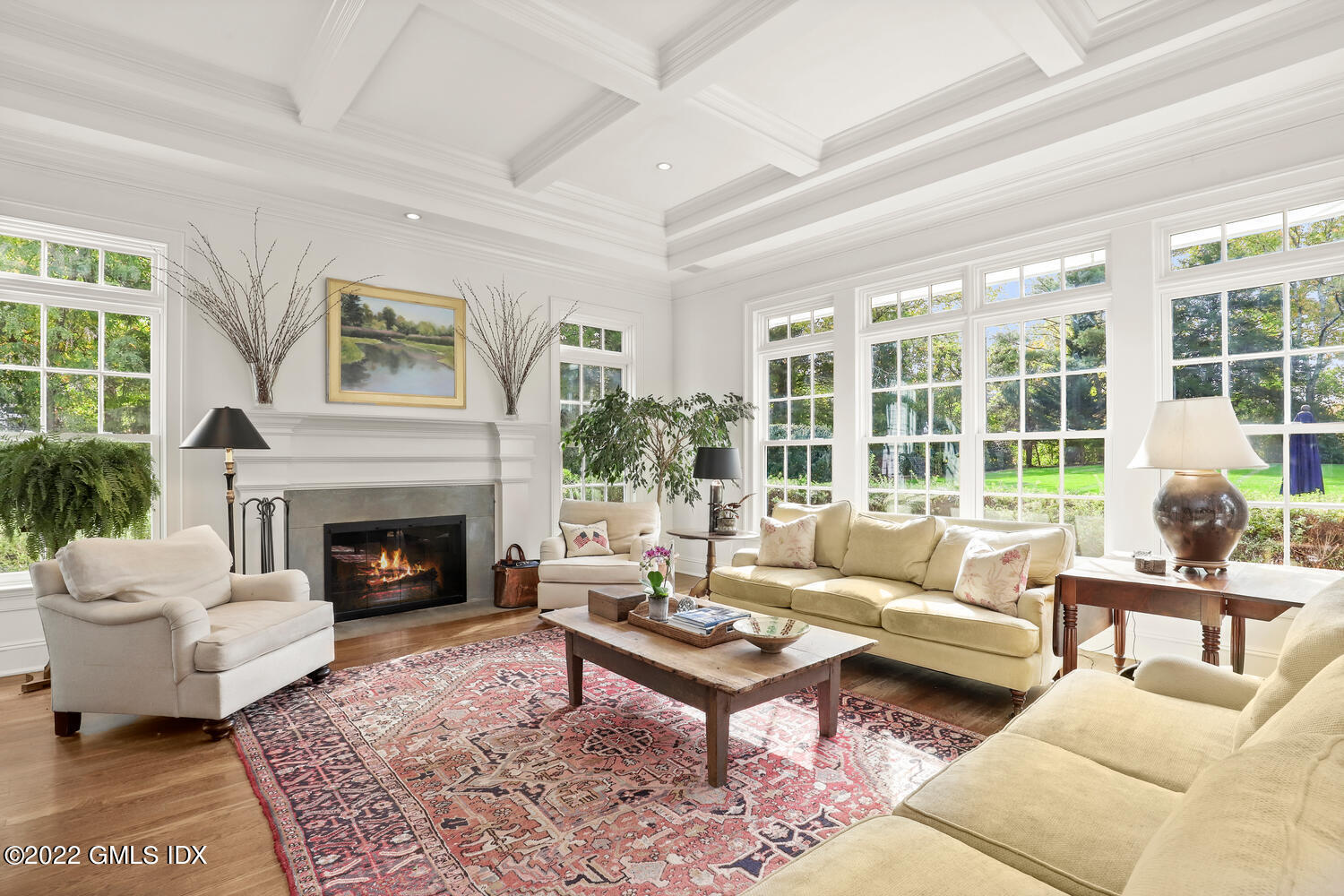 33 Hill Road Greenwich, CT 06830 - Photo 13 of 49 a living room with furniture and a fireplace