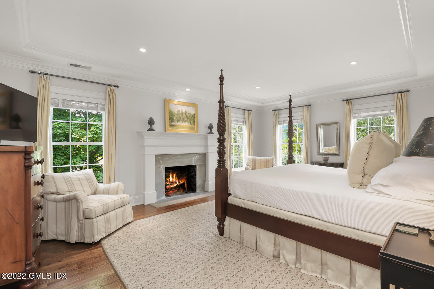 33 Hill Road Greenwich, CT 06830 - Photo 20 of 49 a large white bedroom with a bed and a couch