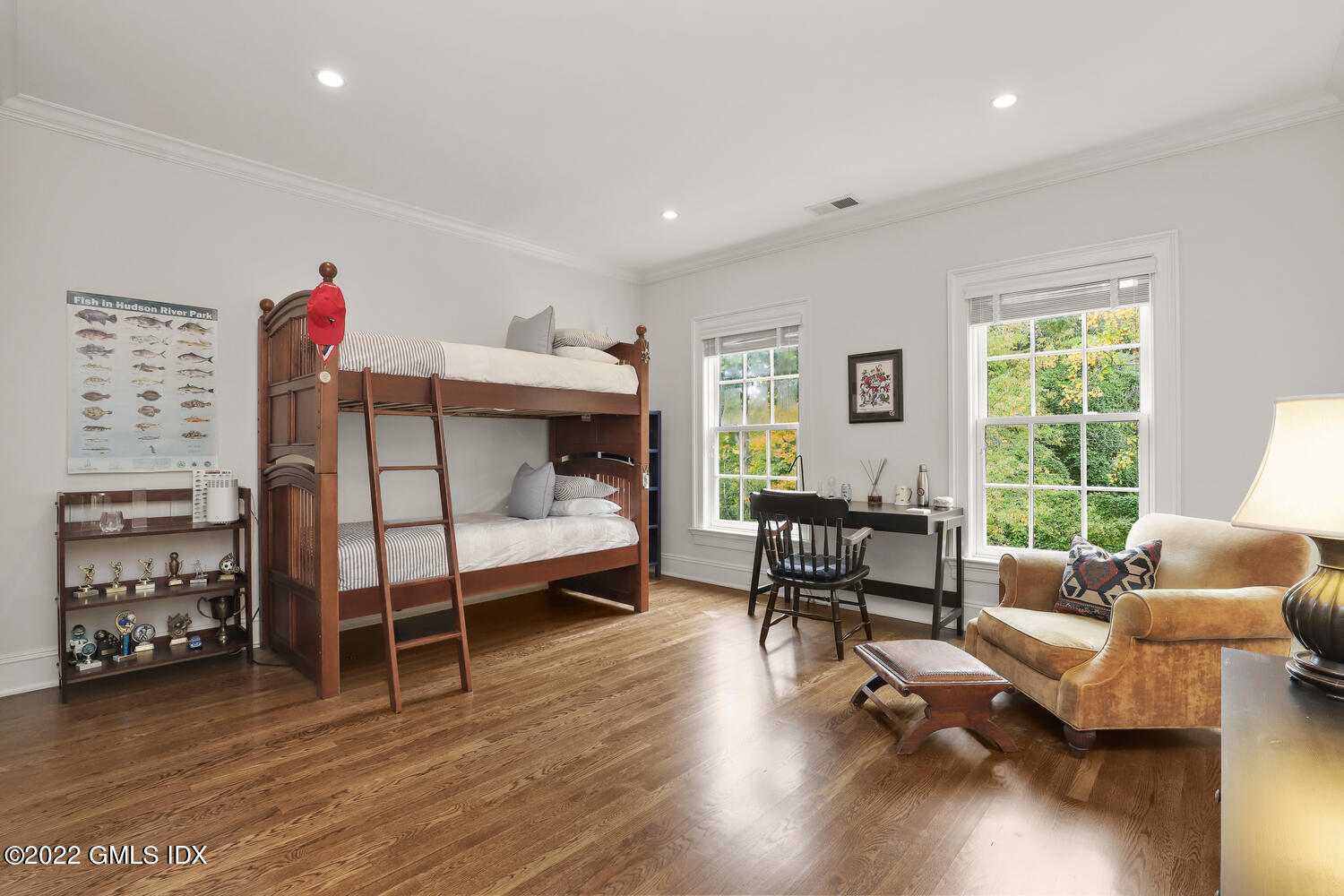 33 Hill Road Greenwich, CT 06830 - Photo 26 of 49 a bedroom with furniture and a wooden floor