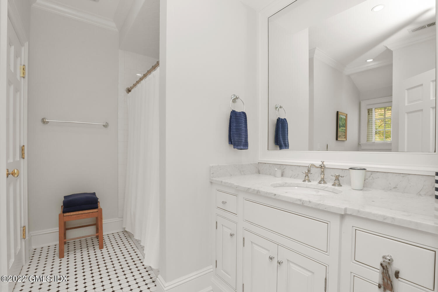 33 Hill Road Greenwich, CT 06830 - Photo 27 of 49 a bathroom with a sink a toilet and a mirror