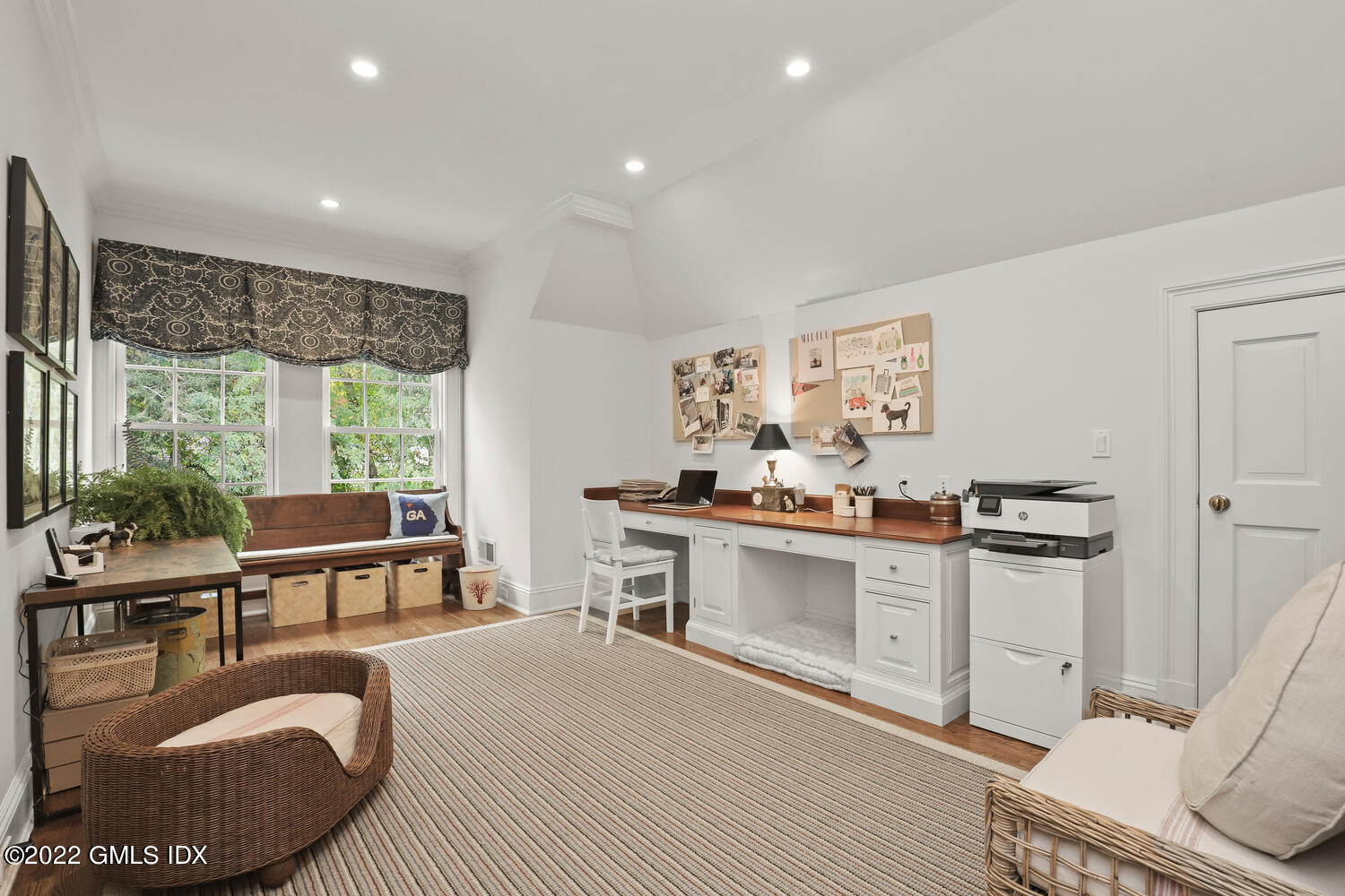 33 Hill Road Greenwich, CT 06830 - Photo 30 of 49 a kitchen with kitchen island a large window in it