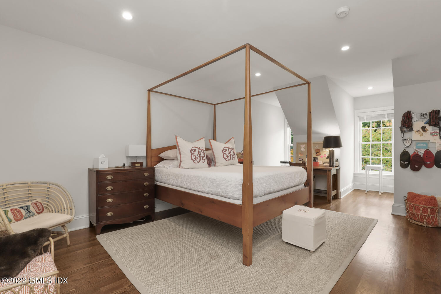 33 Hill Road Greenwich, CT 06830 - Photo 31 of 49 a bedroom with a bed and wooden floor