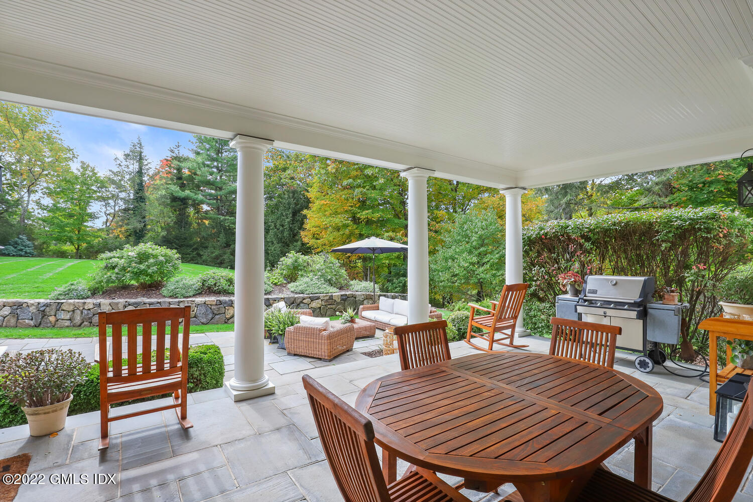 33 Hill Road Greenwich, CT 06830 - Photo 39 of 49 a outdoor living space with patio furniture and garden view