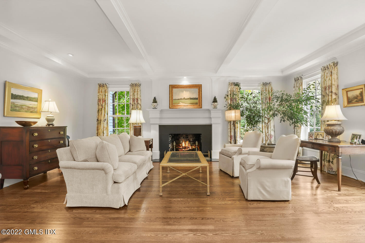 33 Hill Road Greenwich, CT 06830 - Photo 6 of 49 a living room with furniture and a fireplace