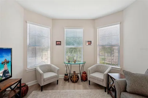 a bedroom with a bed and a table