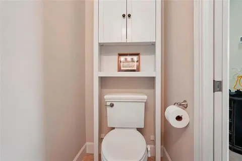 a bathroom with a sink double vanity and a mirror