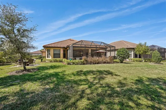 an aerial view of residential building and ocean view