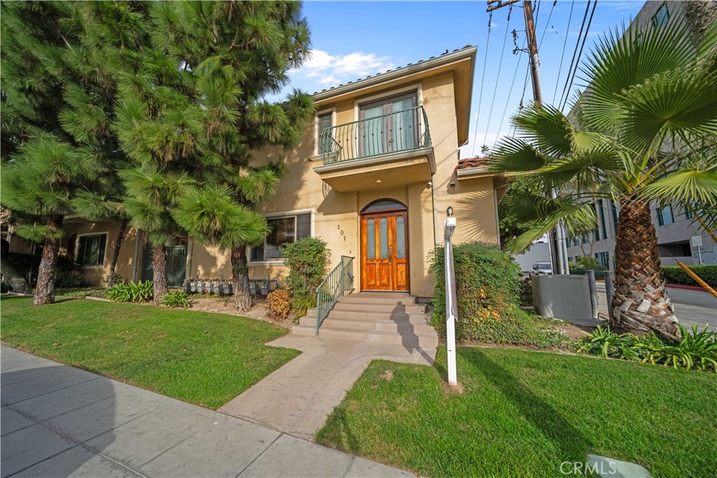 216 North Buena Vista Street Burbank, CA 91505 - Photo 1 of 22 a front view of a house with garden