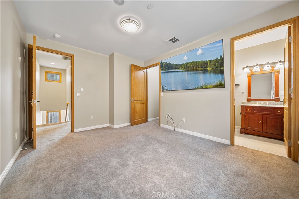 216 North Buena Vista Street Burbank, CA 91505 - Photo 17 of 22 an empty room with a window and a kitchen
