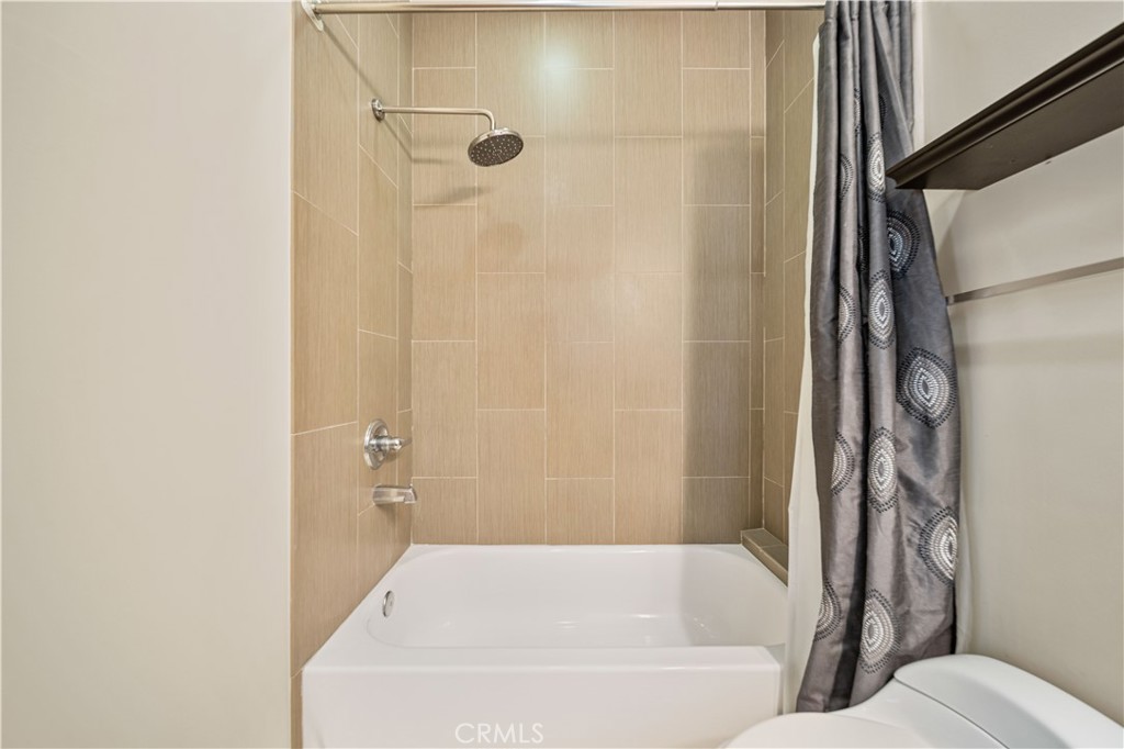 216 North Buena Vista Street Burbank, CA 91505 - Photo 21 of 22 a bathroom with a bathtub with shower