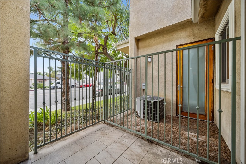 216 North Buena Vista Street Burbank, CA 91505 - Photo 9 of 22 a view of a house with a small yard and floor to ceiling window