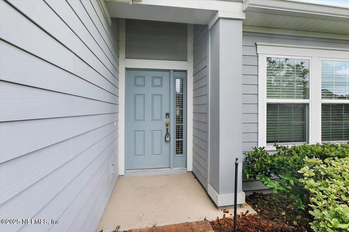 165 Crown Colony Road St. Augustine, FL 32092 - Photo 3 of 25 a view of front door of house