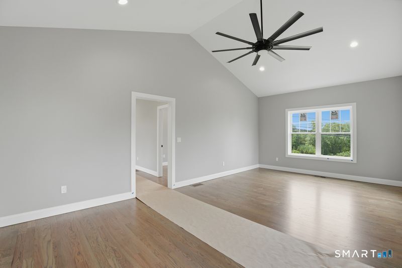 796 Maple Hill Road Naugatuck, CT 06770 - Photo 14 of 35 wooden floor in an empty room with a window