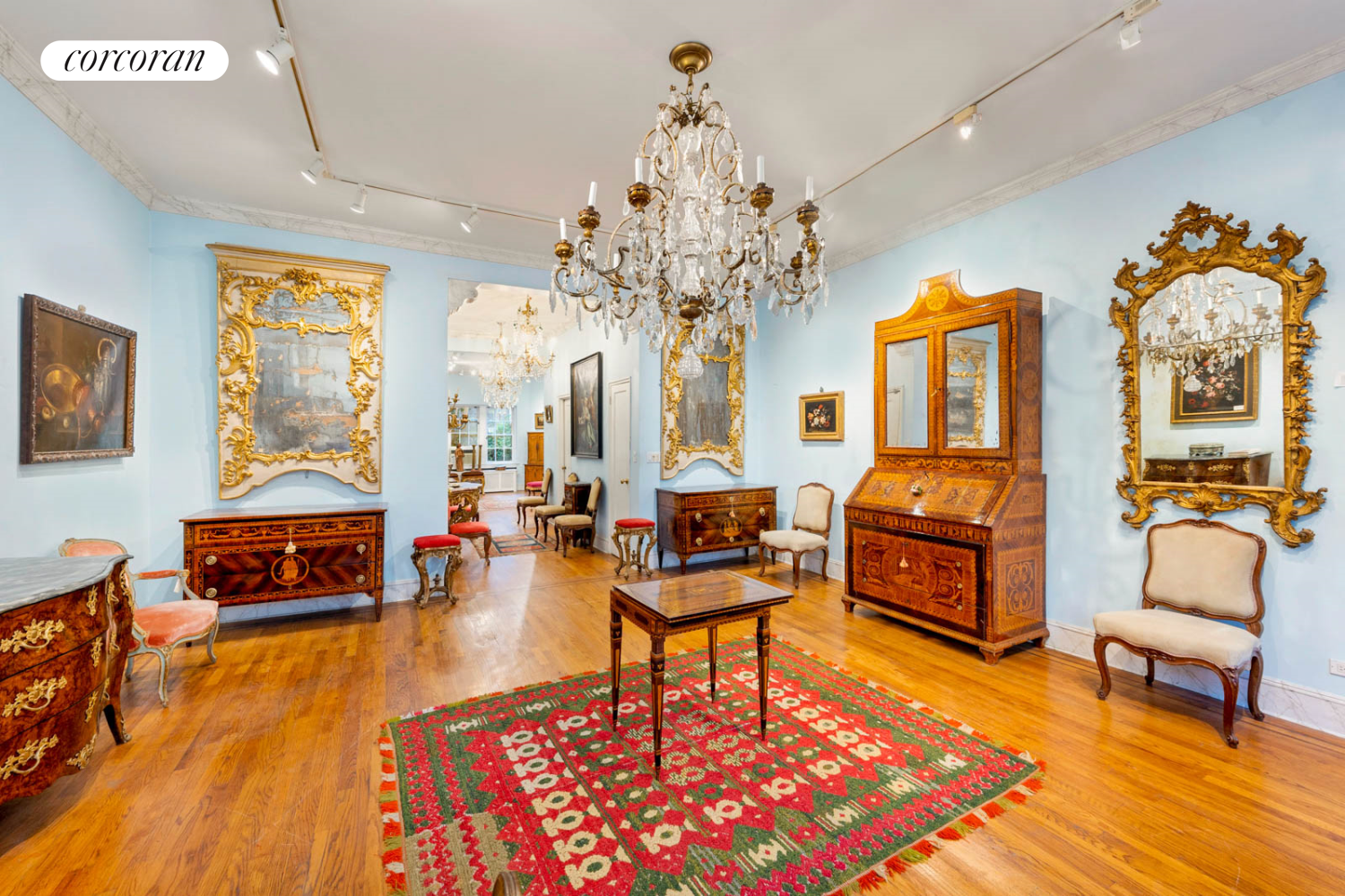 36 East 73rd Street Manhattan, NY 10021 - Photo 10 of 31 a living room with fireplace furniture and a chandelier