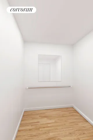 a living room with furniture a fireplace and a chandelier