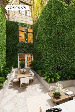 a view of empty room with wooden floor and fireplace