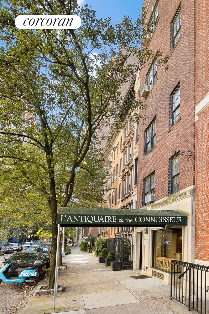 36 East 73rd Street Manhattan, NY 10021 - Photo 23 of 31 view of building with large tree