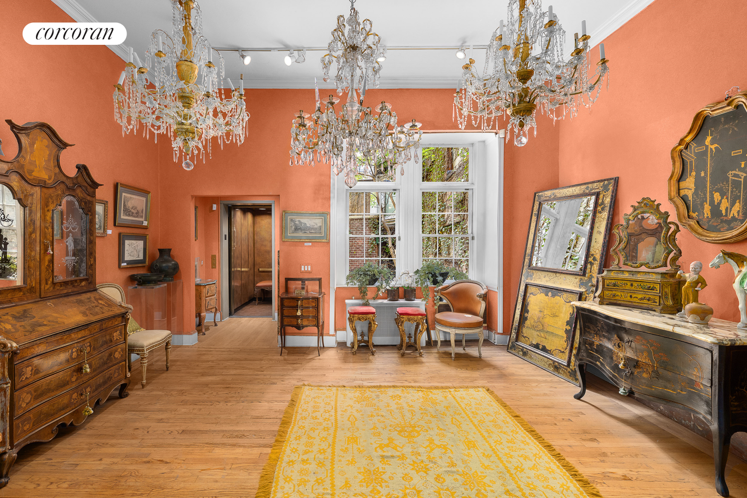 36 East 73rd Street Manhattan, NY 10021 - Photo 4 of 31 a living room with patio furniture and a chandelier