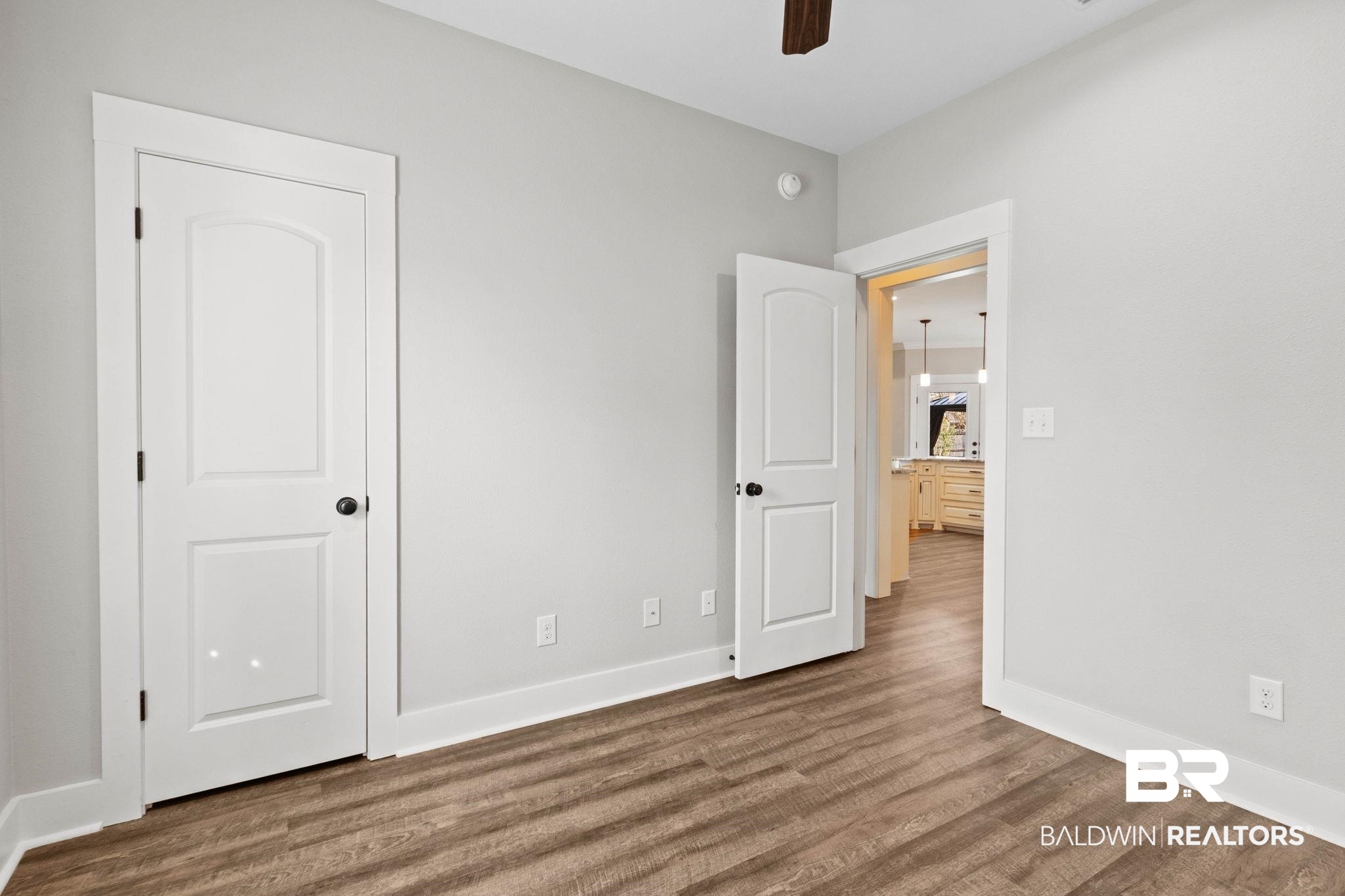 17376 Bankhead Boulevard Fairhope, AL 36532 - Photo 47 of 73 Unfurnished bedroom featuring dark wood-type flooring and ceiling fan