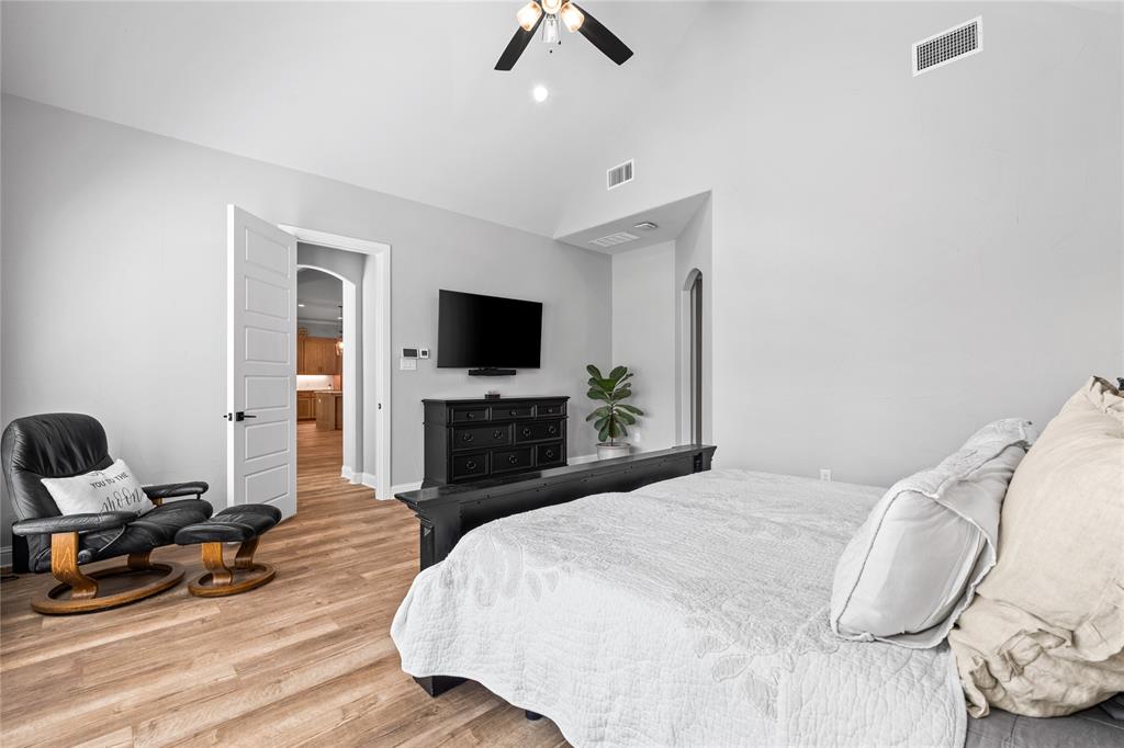 6707 Anchor Quinlan, TX 75474 - Photo 19 of 40 Huge primary bedroom suite split from other bedrooms for ultimate privacy