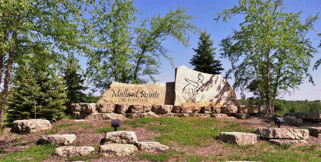 10273 Saddle Path Road Belvidere, IL 61008 - Photo 1 of 4 a view of a park with large trees