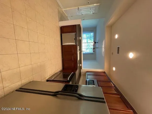 a view of a livingroom with a ceiling fan