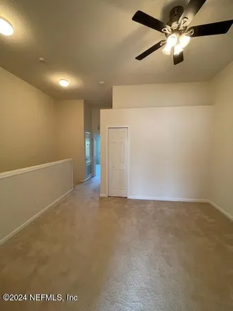 a bathroom with a shower and a sink