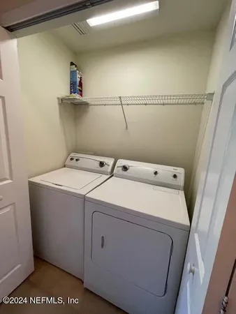 a bathroom with a sink a vanity and a mirror