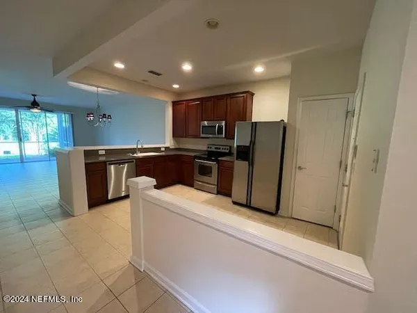 a view of empty room with windows