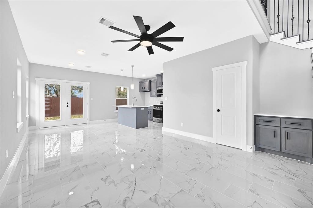 7517 Hezekiah Lane, Unit B Houston, TX 77088 - Photo 4 of 13 a view of a kitchen with a sink and cabinet area