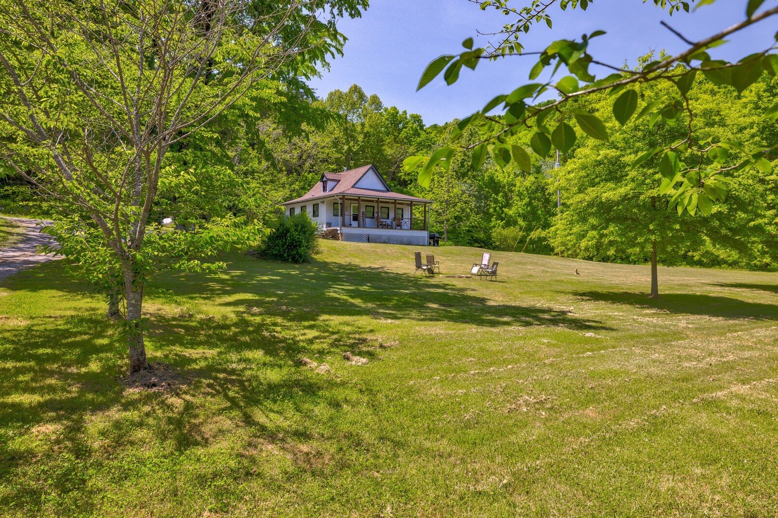 150 Farwell Road Dowelltown, TN 37059 - Photo 31 of 50 a house with a yard