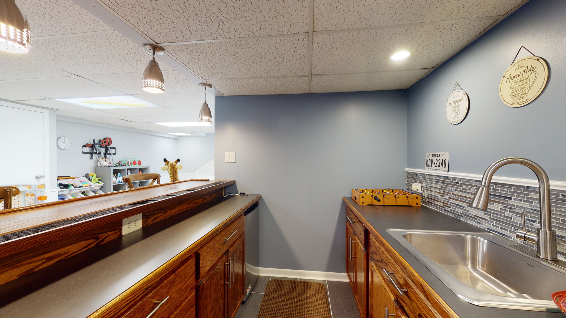 1017 Weeping Willow Drive Wheeling, IL 60090 - Photo 25 of 34 a kitchen with a sink and a stove top oven