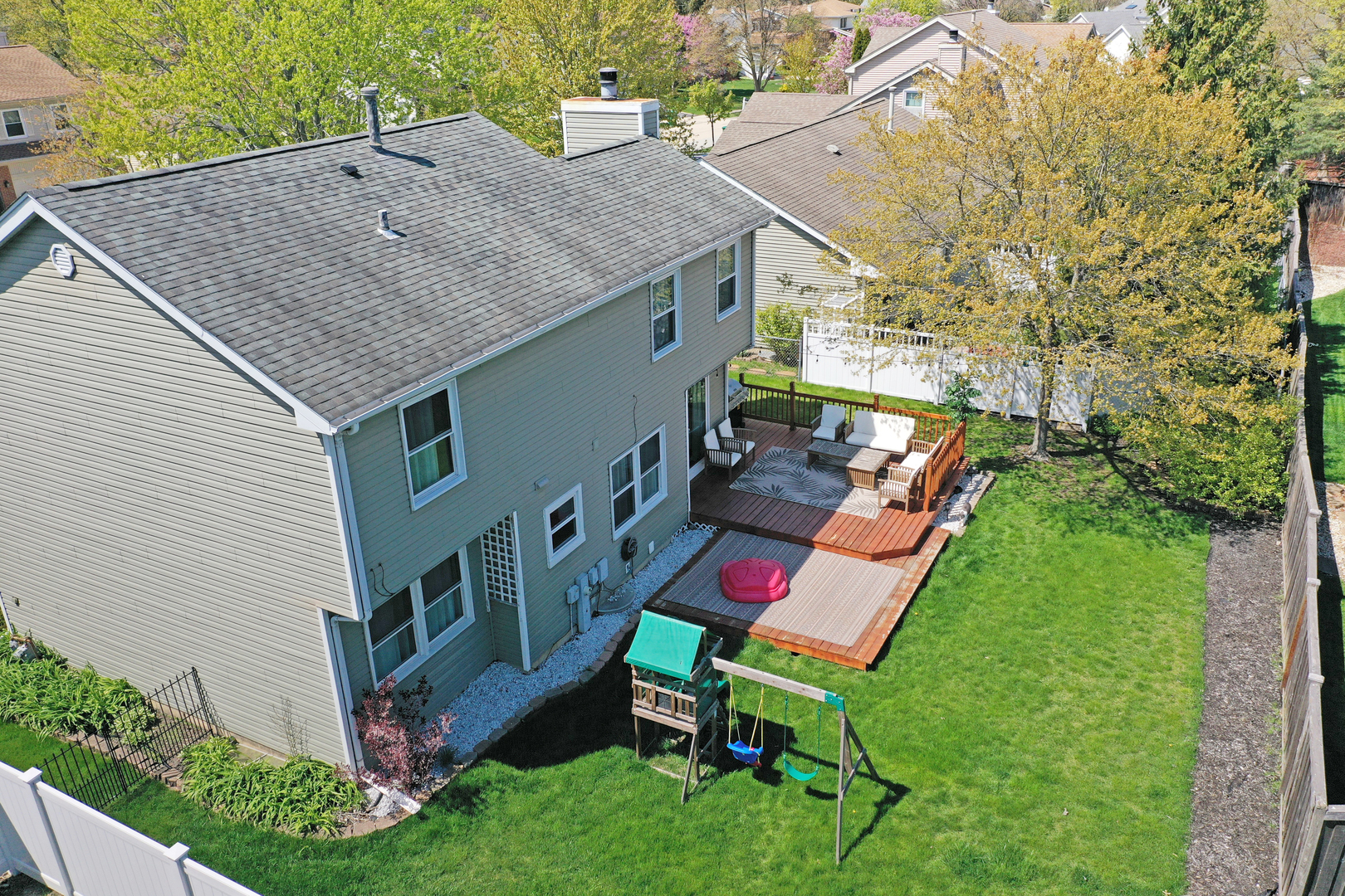 1017 Weeping Willow Drive Wheeling, IL 60090 - Photo 34 of 34 a backyard of a house with table and chairs