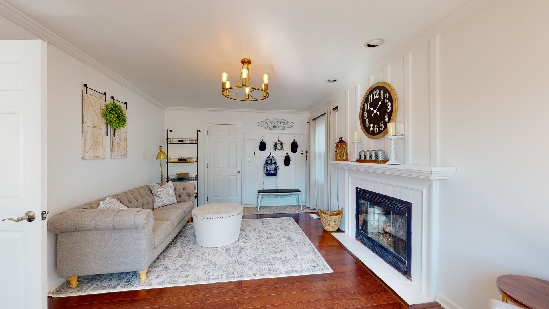 1017 Weeping Willow Drive Wheeling, IL 60090 - Photo 10 of 34 a living room with furniture and a fireplace