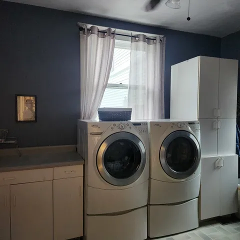 an empty room with wooden floor and closet