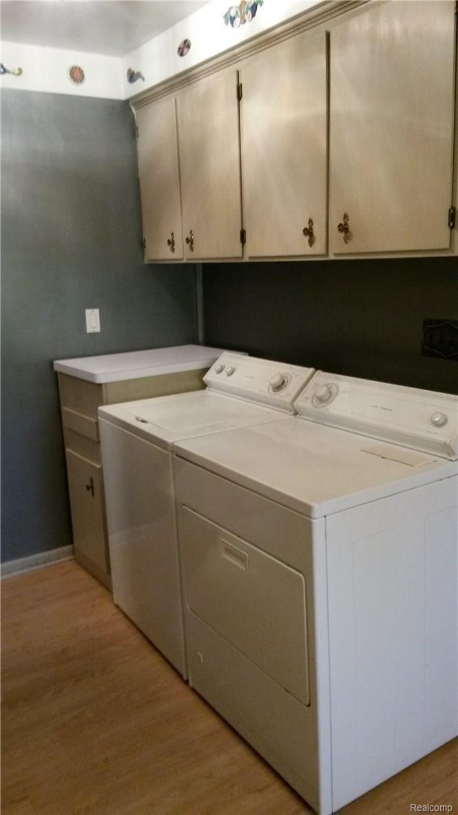 1195 Torpey Road Troy, MI 48083 - Photo 19 of 39 Convenient First Floor Laundry with Cabinets. Appliances Included.