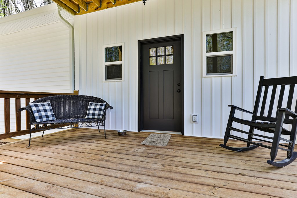 2001 Big Creek Road Ellijay, GA 30536 - Photo 18 of 73 a view of a house with wooden floor and a chair