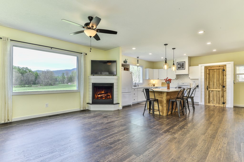 2001 Big Creek Road Ellijay, GA 30536 - Photo 20 of 73 a living room with furniture and a fireplace
