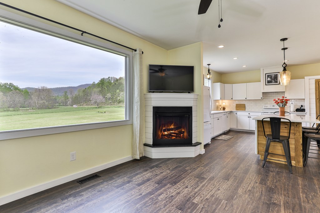 2001 Big Creek Road Ellijay, GA 30536 - Photo 22 of 73 a living room with furniture and a fireplace