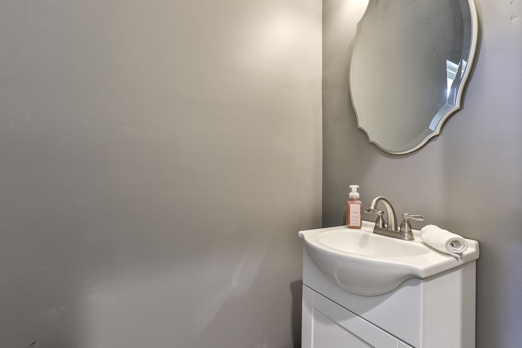 2001 Big Creek Road Ellijay, GA 30536 - Photo 26 of 73 a bathroom with a sink and mirror