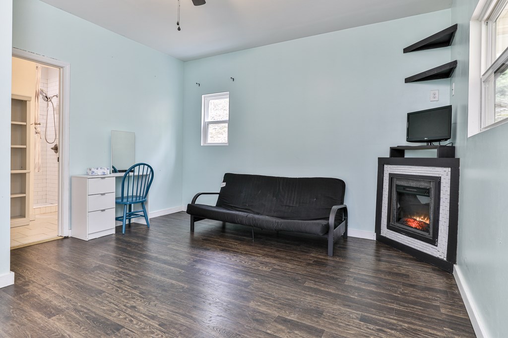 2001 Big Creek Road Ellijay, GA 30536 - Photo 28 of 73 a living room with furniture and a fireplace