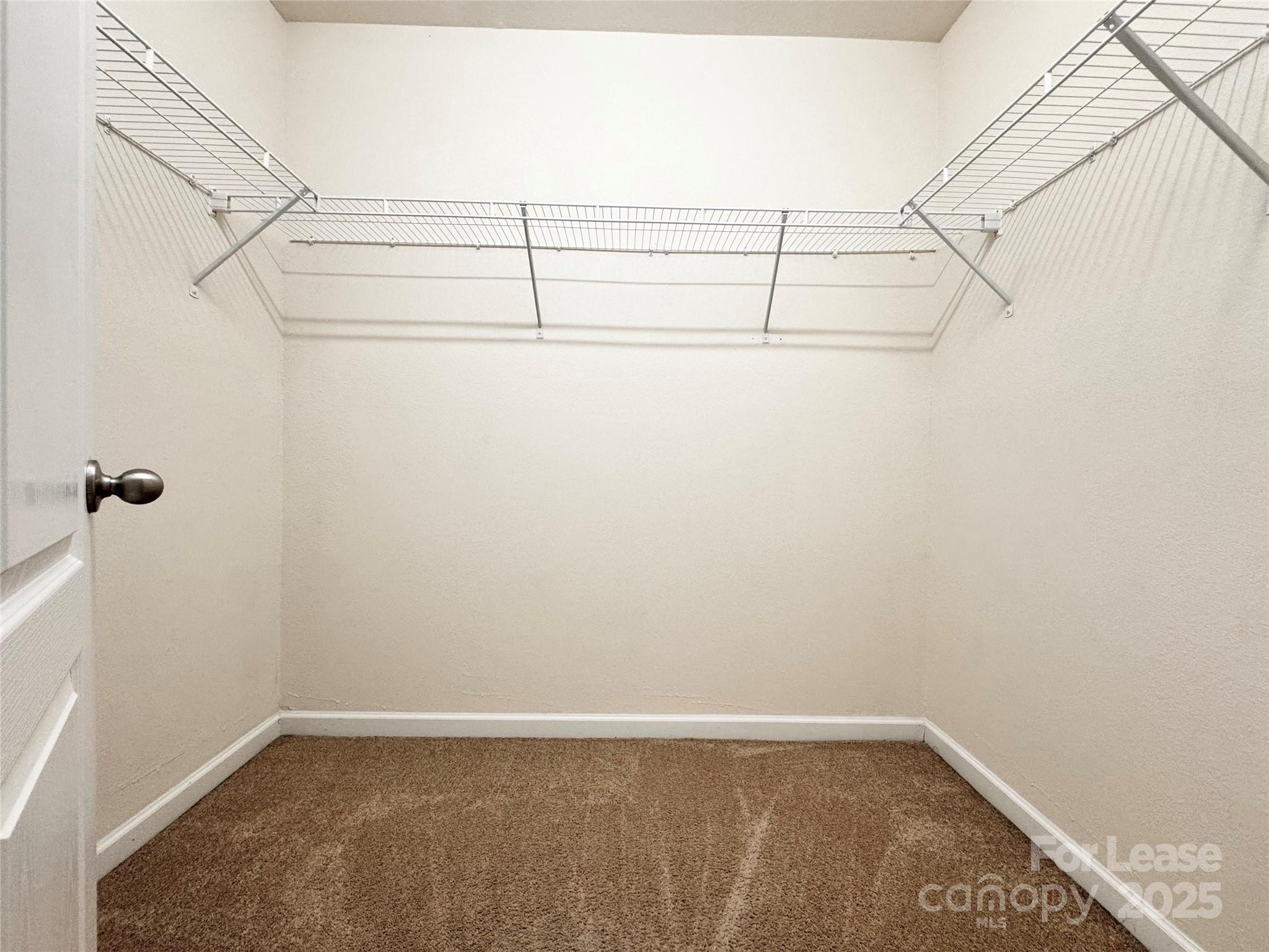 6717 Ware Road Charlotte, NC 28212 - Photo 14 of 22 a view of a room with racks on the wall