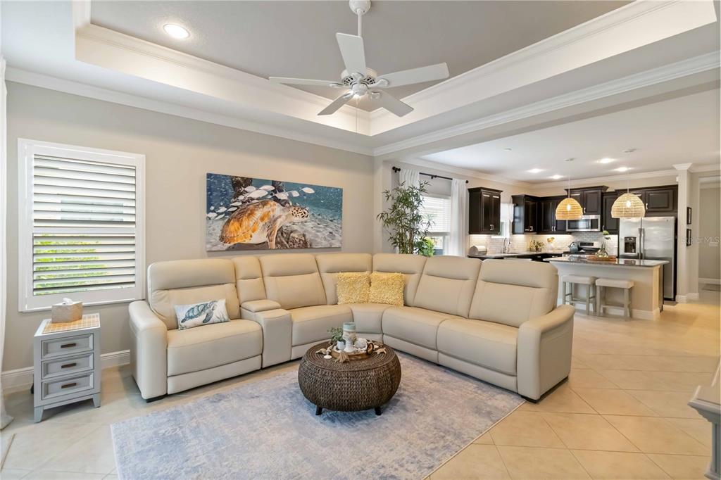 12252 Stuart Drive Venice, FL 34293 - Photo 13 of 70 a living room with furniture and a large window