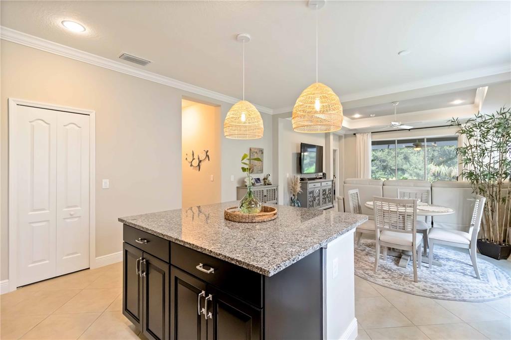 12252 Stuart Drive Venice, FL 34293 - Photo 14 of 70 a view of a dining room with furniture window and outside view