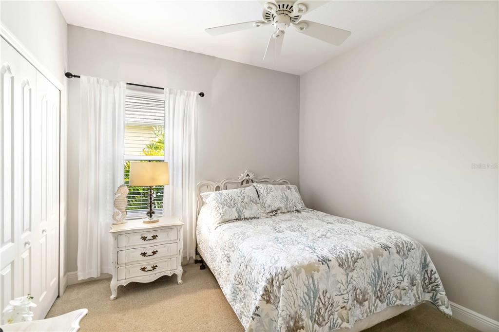 12252 Stuart Drive Venice, FL 34293 - Photo 26 of 70 a bedroom with a bed and a window