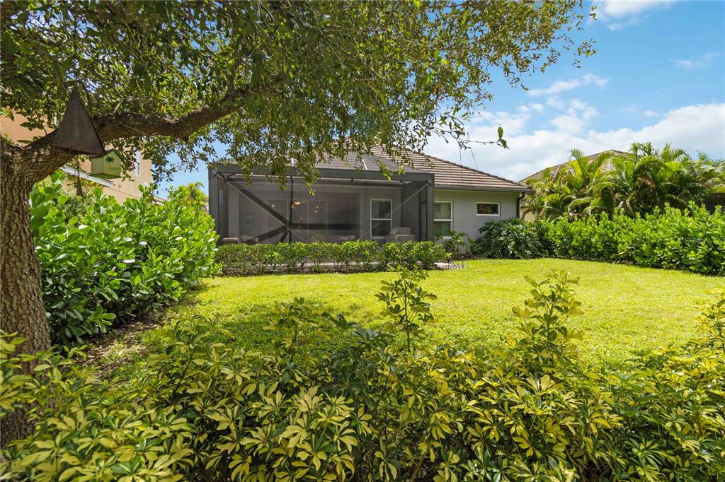 12252 Stuart Drive Venice, FL 34293 - Photo 42 of 70 a view of a house with a yard