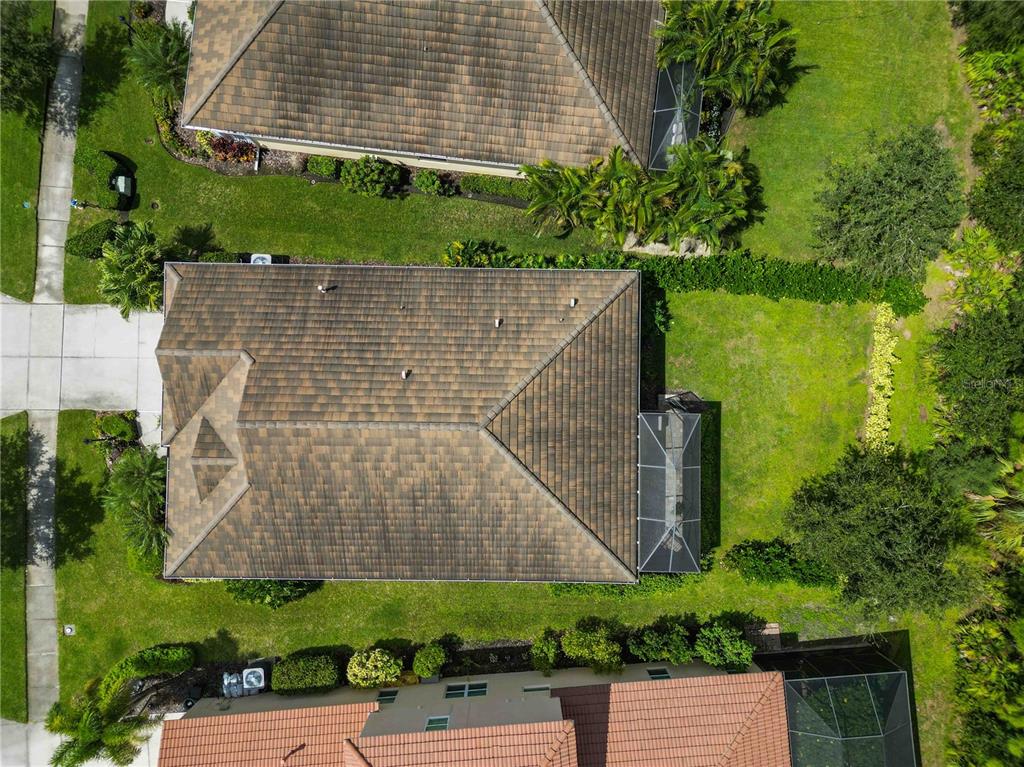 12252 Stuart Drive Venice, FL 34293 - Photo 46 of 70 an aerial view of a house having yard