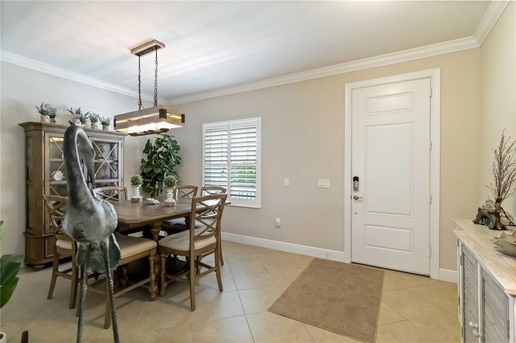 12252 Stuart Drive Venice, FL 34293 - Photo 5 of 70 a view of a room with furniture and window
